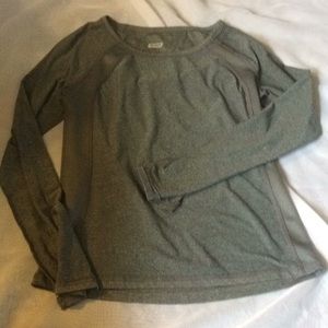 Grey long sleeve athletic shirt.